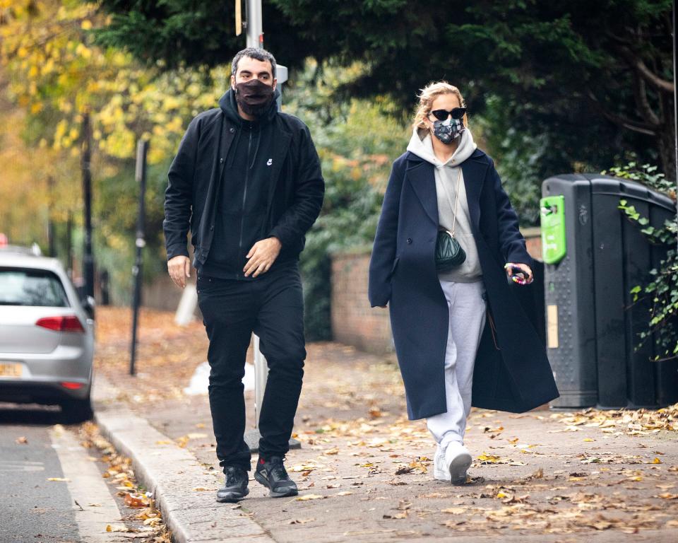 Romain Gavras and Rita Ora walking in 2020.