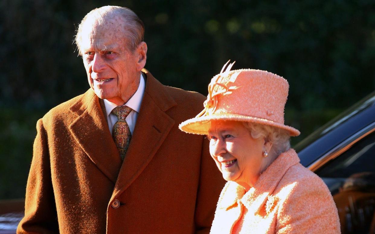 The Duke of Edinburgh and Queen Elizabeth II arrive at St. Mary's Church in Hillington, Norfolk, for a morning church service - Gareth Fuller 