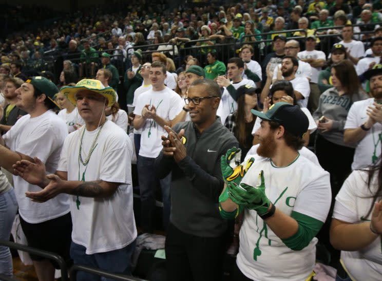 Willie Taggart (grey) says his strength coach didn’t act improperly during January conditioning sessions. (AP)