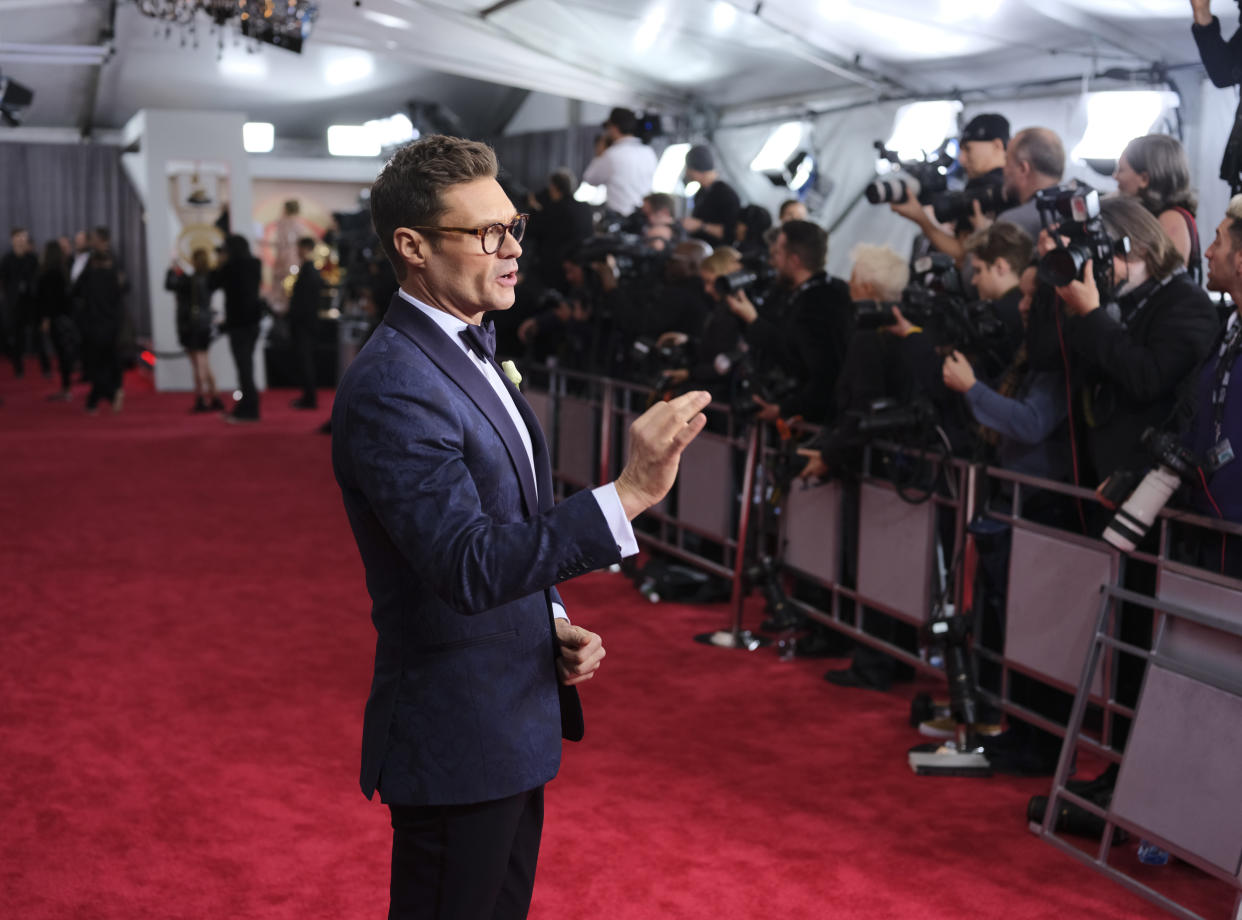 Ryan Seacrest has hosted E!’s red carpet coverage for more than a decade. Now, people wonder if it’s time for fresh faces. (Photo: Getty Images)