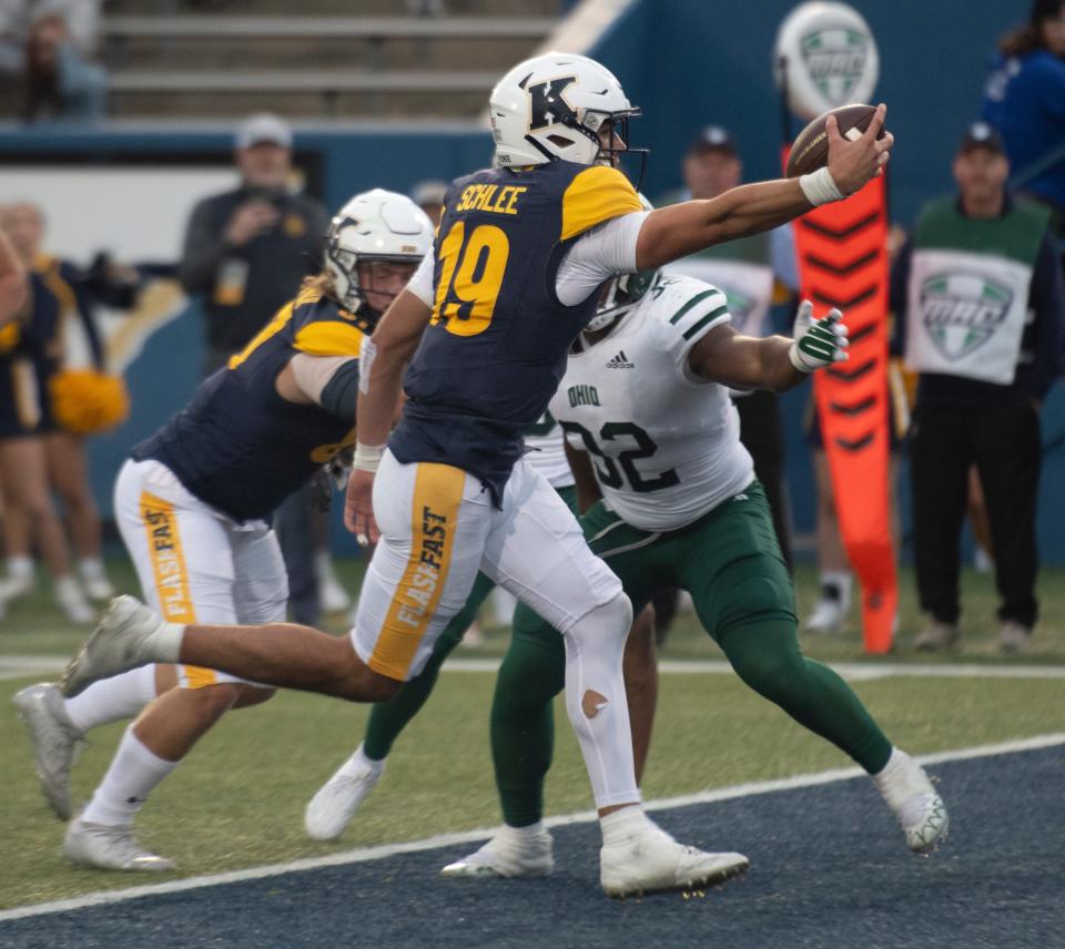 Quarterback Collin Schlee scores the touchdown that tied the game late in the fourth quarter on a keeper.