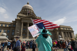 Demonstrators line up in front of the front steps of the Idaho State Capitol Building for a pro-abortion rally.