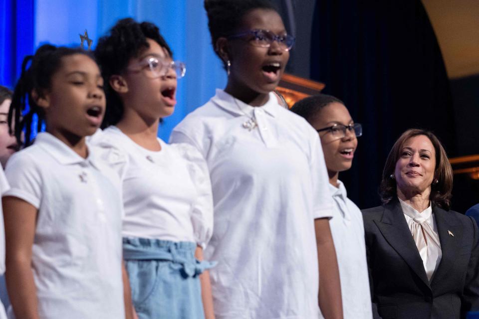 Vice President Kamala Harris listens as students from the Sela Public Charter School sing in Hebrew during Israel's Independence Day Reception in Washington, DC, on June 6, 2023.