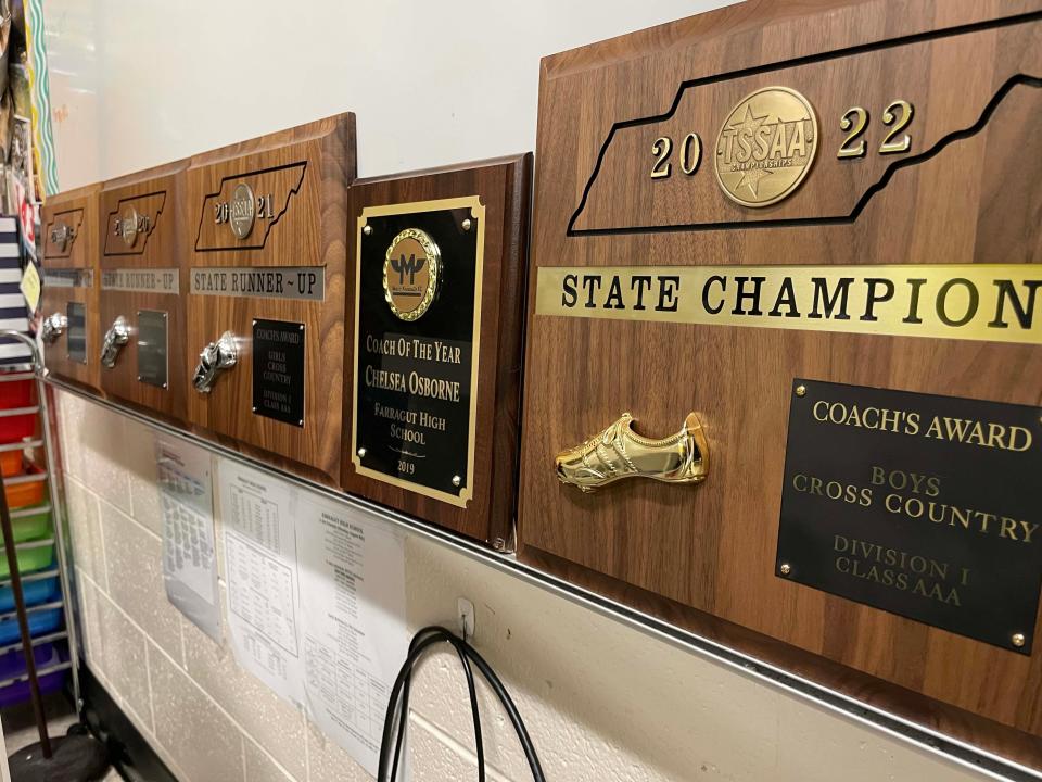 Coaching awards line her classroom, giving proof Chelsea Osborne is a talented cross country coach.