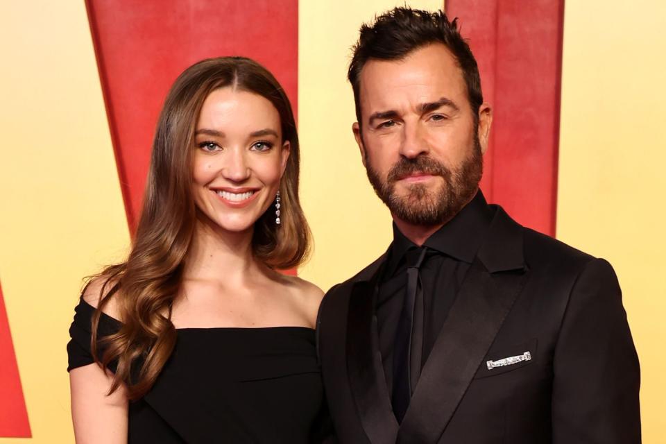 <p>Amy Sussman/Getty</p> Nicole Brydon Bloom and Justin Theroux at the 2024 Vanity Fair Oscars party in Los Angeles on March 10, 2024