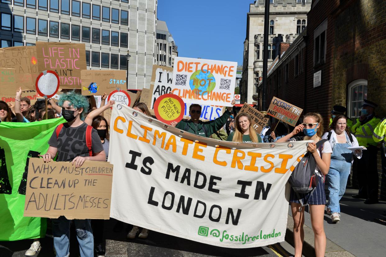 Protesters march with banners and placards expressing their opinion during the demonstration. Over 200 protestors gathered in Parliament Square while demanding government action over climate crisis. (Photo by Thomas Krych / SOPA Images/Sipa USA)