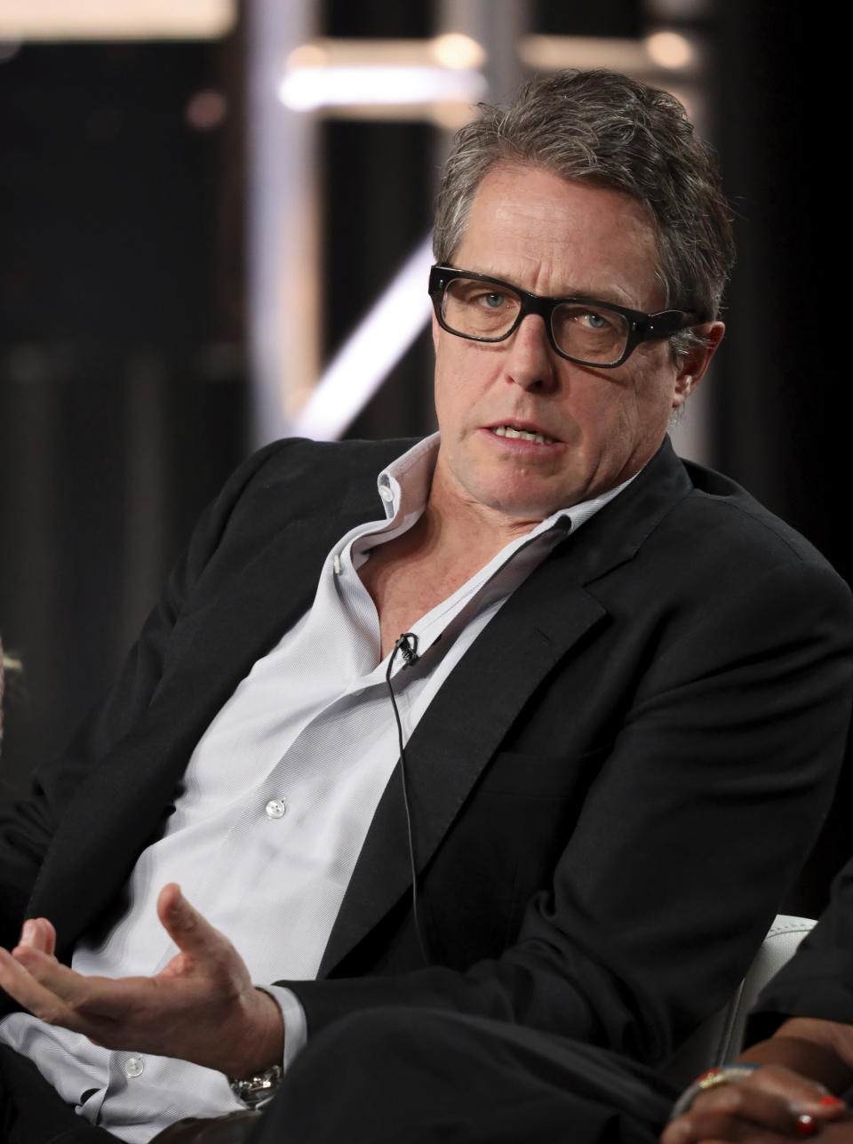 Hugh Grant speaks at the "The Undoing" panel during the HBO TCA 2020 Winter Press Tour at the Langham Huntington on Wednesday, Jan. 15, 2020, in Pasadena, Calif. (Photo by Willy Sanjuan/Invision/AP)