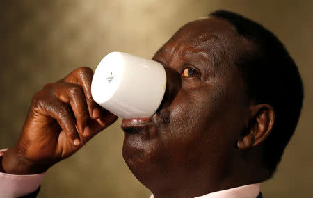 Kenya's opposition party leader, Raila Odinga, drinks tea following an interview in London, Britain October 13, 2017. REUTERS/Peter Nicholls