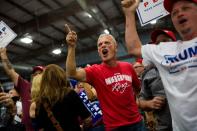 A supporter of Republican presidential candidate Donald Trump jeers at the media at a rally in Newtown, Pennsylvania