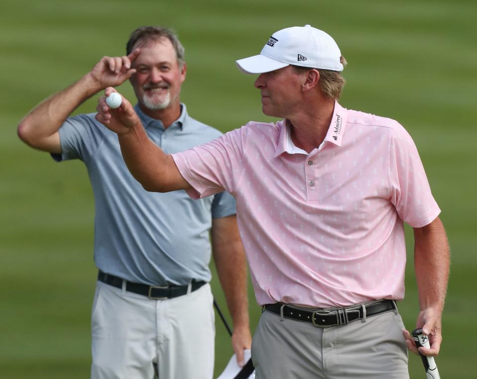 Jerry Kelly watches as Steve Stricker celebrates his win at the Bridgestone Senior Players Championship at Firestone Country Club on Friday June 27, 2021 in Akron.