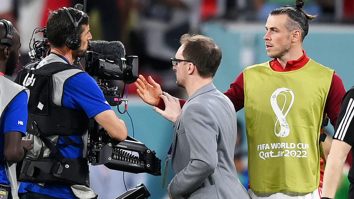 Gareth Bale can be seen in an exchange with a cameraman at the FIFA World Cup in Qatar.