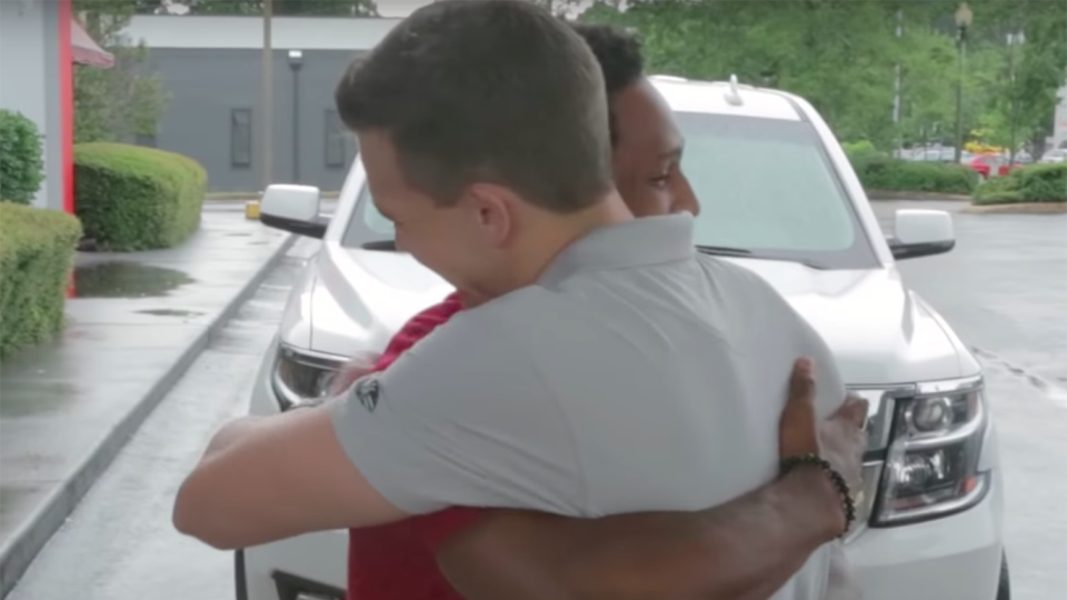 Walter Carr hugs his new boss after finding out he had a new car. Source: Go FundMe/Thank You Walter