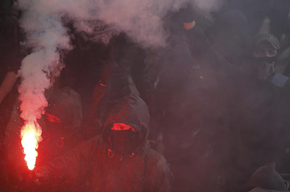 Protesters take part in a march in Nantes