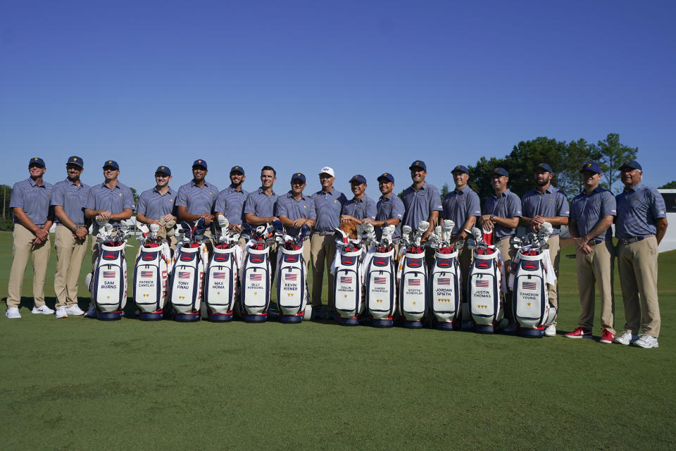 Team USA poses for a photo before practice for the Presidents Cup golf tournament at the Quail Hollow Club, Wednesday, Sept. 21, 2022, in Charlotte, N.C. (AP Photo/Julio Cortez)