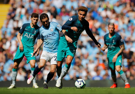 Soccer Football - Premier League - Manchester City v Tottenham Hotspur - Etihad Stadium, Manchester, Britain - April 20, 2019 Tottenham's Dele Alli in action with Manchester City's Bernardo Silva REUTERS/Phil Noble