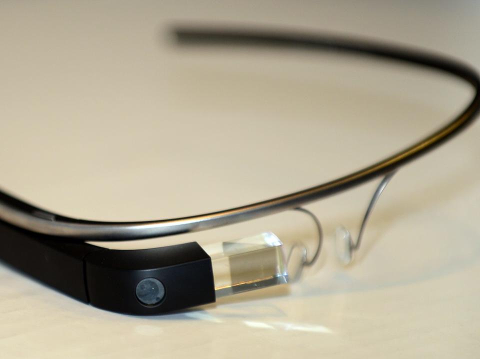 There is a Google Glass on a table.