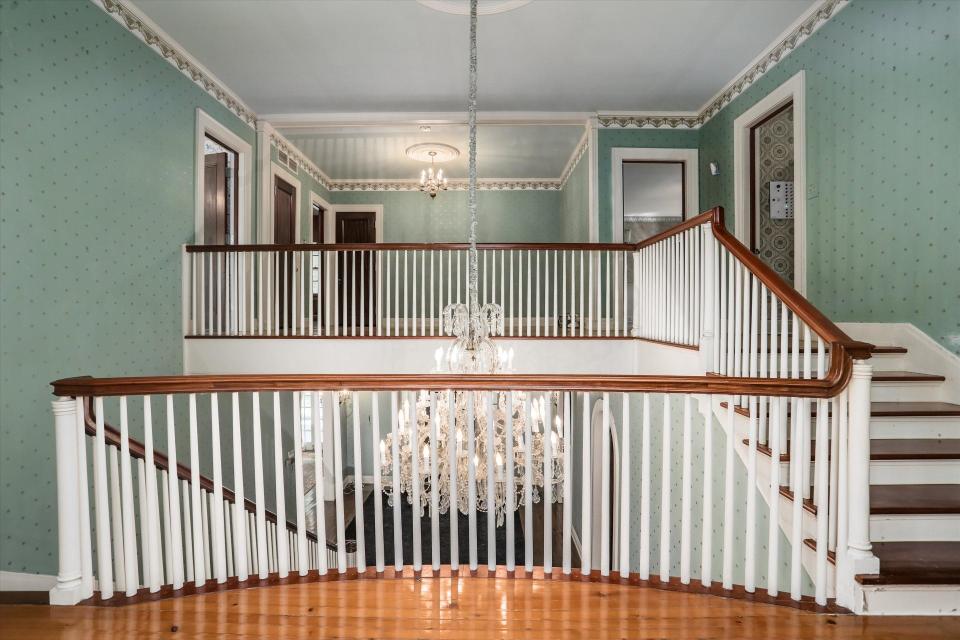 Among the home's lavish features are crystal chandeliers.