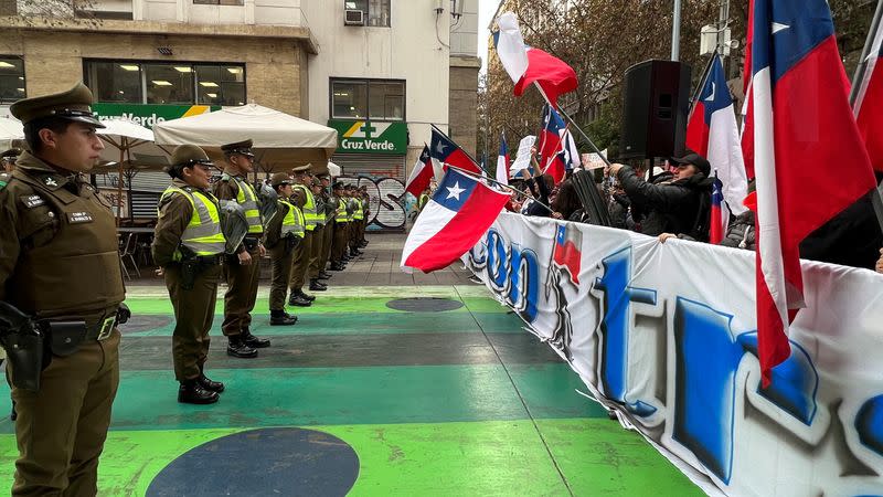 Demonstrators protest against the first session of Chile's Constitutional Council in Santiago