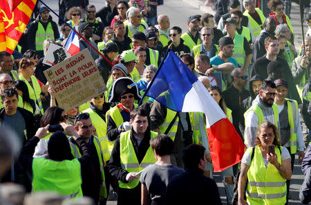 Protesters wearing yellow vests take part in a demonstration of the "yellow vests" movement in Marseille, France, February 23, 2019. REUTERS/Jean-Paul Pelissier