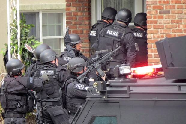 Swatting is the practice of making false reports to police in hopes of provoking an armed response. (Jim Staubitser/Newsday/Associated Press - image credit)