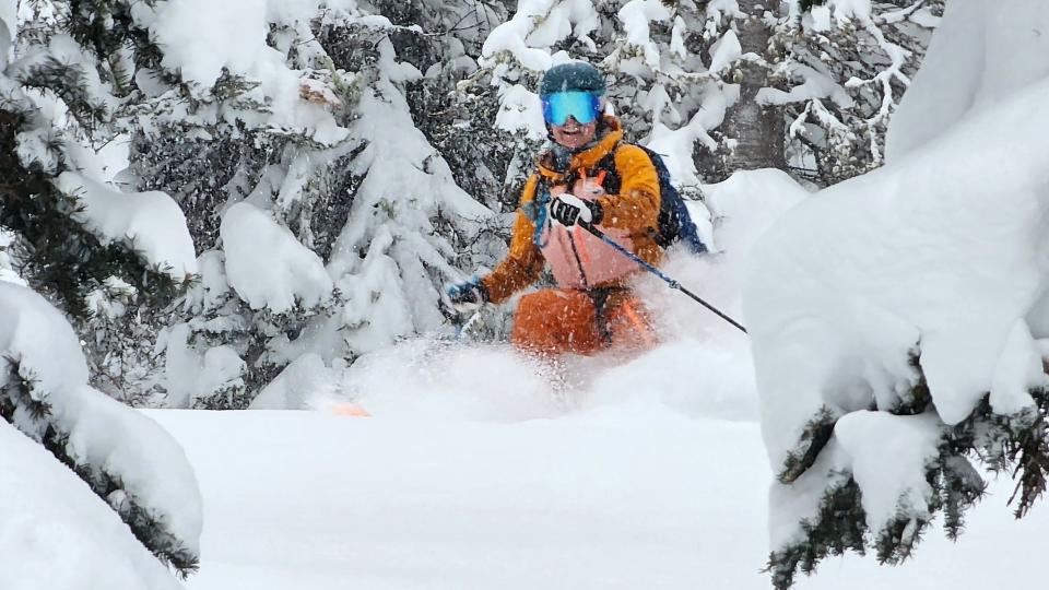 Woman wearing Ortovox Mesola ski jacket for skiing