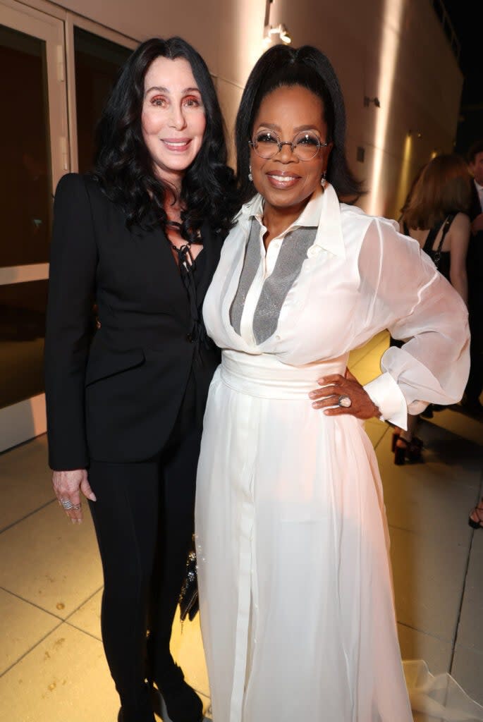 Cher and Oprah Winfrey bring big-star wattage to the “Sidney” documentary premiere at the Academy Museum of Motion Pictures in Los Angeles. (Eric Charbonneau for Apple TV+)