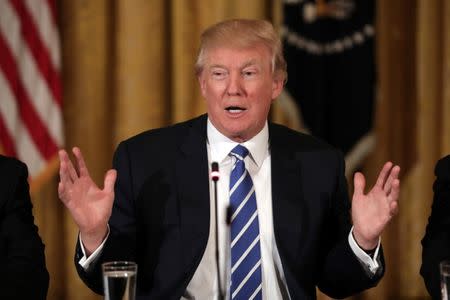 U.S. President Donald Trump attends a meeting with U.S. House Deputy Whip team at the East room of the White House in Washington, U.S. March 7, 2017. REUTERS/Carlos Barria