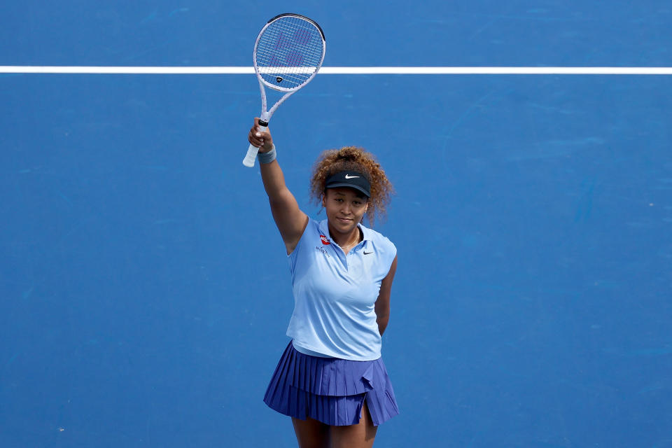 Naomi Osaka (pictured) celebrates after defeating Cori Gauff 6-4, 3-6, 6-4 during Western & Southern Open.