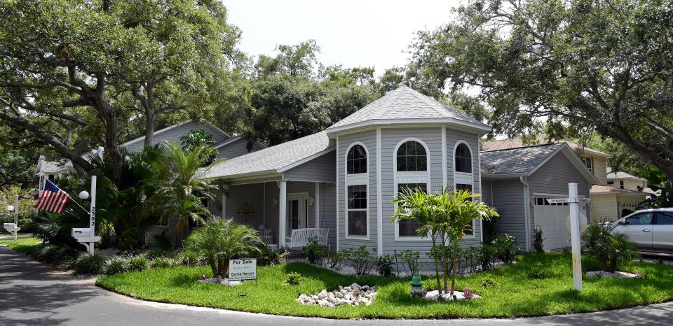 This three-bedroom, two-bath single-family home with a two-car garage at 2302 63rd St. W. is 1,632 square feet, with an asking price of $499,900.