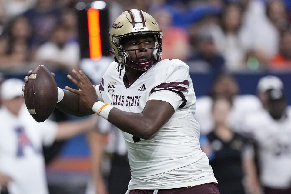 FILE - Texas State quarterback TJ Finley (7) throws against UTSA during the first half of an NCAA college football game, Saturday, Sept. 9, 2023, in San Antonio. Texas State takes on Rice at the 1st Responder Bowl. (AP Photo/Eric Gay, File)