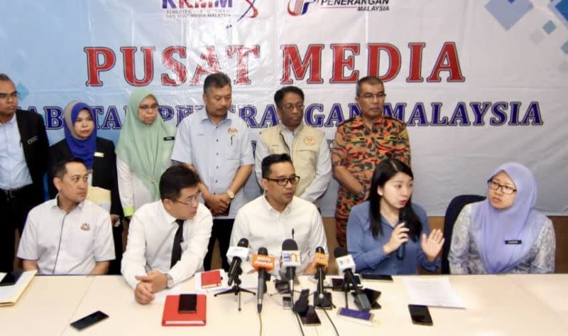 Yeo (seated, second from right) speaks to reporters during a media conference at the Pasir Gudang Municipal Council. — Picture by Ben Tan