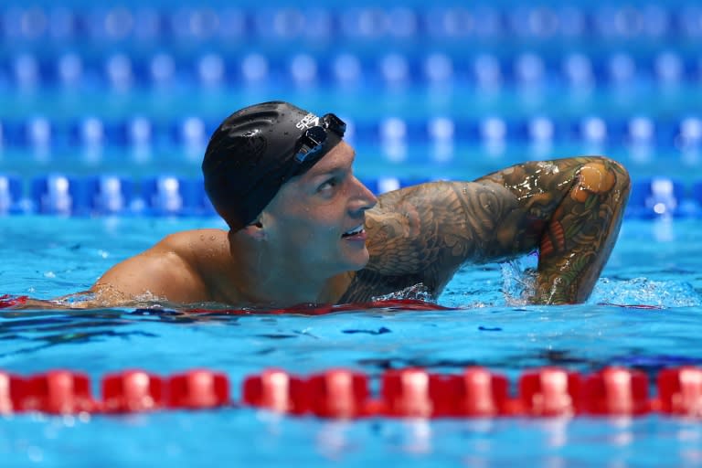 Caeleb Dressel checks the scoreboard after the men's 100m freestyle final at the US Olympic swimming trials (Sarah Stier)