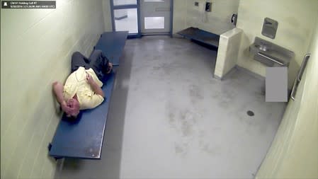 Guy Leonard lies down in his cell at the Chatham County Detention Center in Savannah