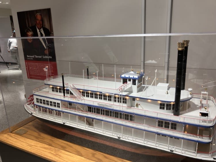 A display honoring Bernie Goldstein of Alter Company, who lobbied for riverboat gambling in Iowa in 1989, and a model of his Diamond Lady, the nation’s first gaming riverboat. It set sail on April 1, 1991 in Bettendorf.