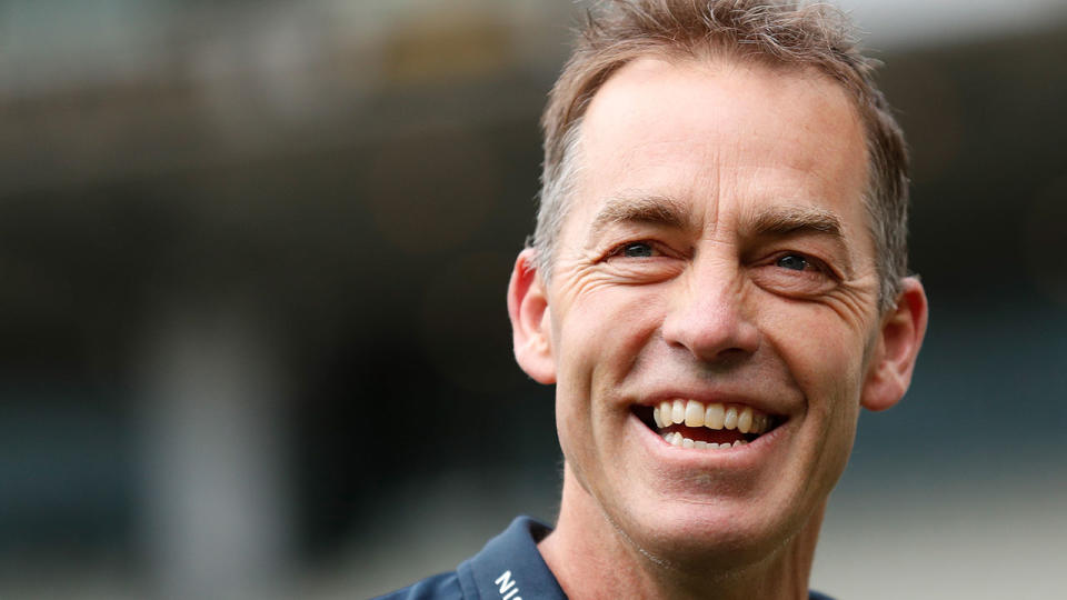 Seen here, former Hawthorn coach Alastair Clarkson shares a laugh at training.