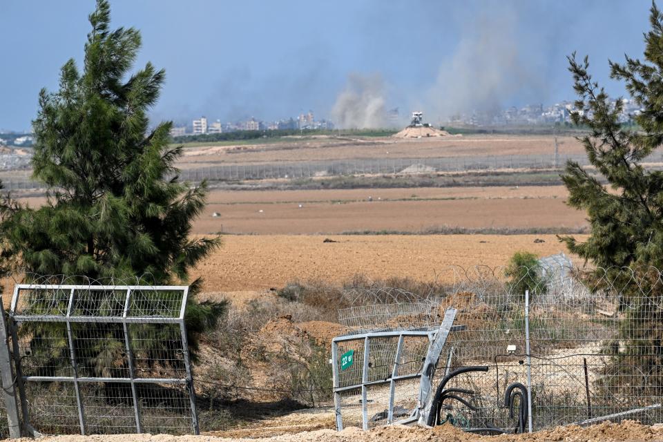 October 10, 2023: Smoke rises in the distance from Gaza near the spot where Hamas militants broke through the kibbutz Kfar Aza's fence days earlier. This kibbutz in Israel just over a mile from the Gaza border.