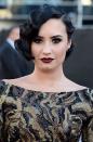 The singer went for a classic ‘20s hair ‘do complete with a modern twist of heavy smoky black eye makeup, deep red wine lips and lightly blushed cheeks. This was definitely a stand out look on the red carpet of the 2015 American Music Awards in Los Angeles.