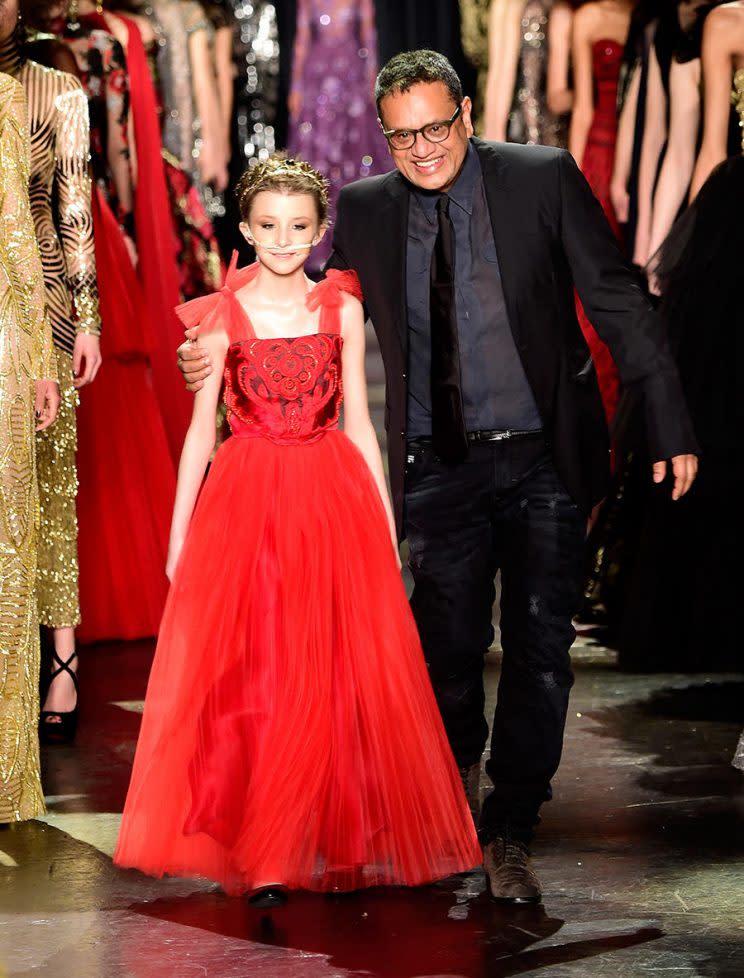 Trinity Faith Moran with designer Naeem Khan at the Naeem Khan Fall 2016 during New York Fashion Week. (Photo: Getty Images)