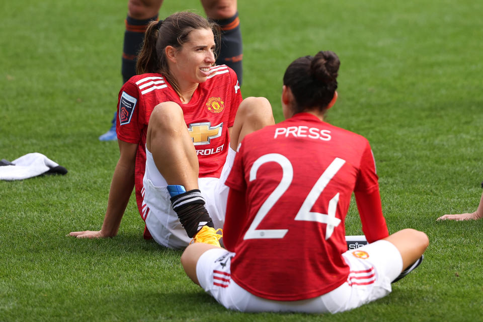 Tobin Heath and Christen Press had hot jersey sales after signing with Manchester United. (Matthew Ashton - AMA/Getty Images)