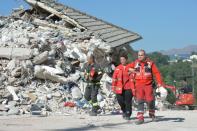 Britain's foreign office confirmed a British couple had been killed in the quake as well as a 14-year-old boy, and Romania said two of its nationals, who were living in Italy, also died 