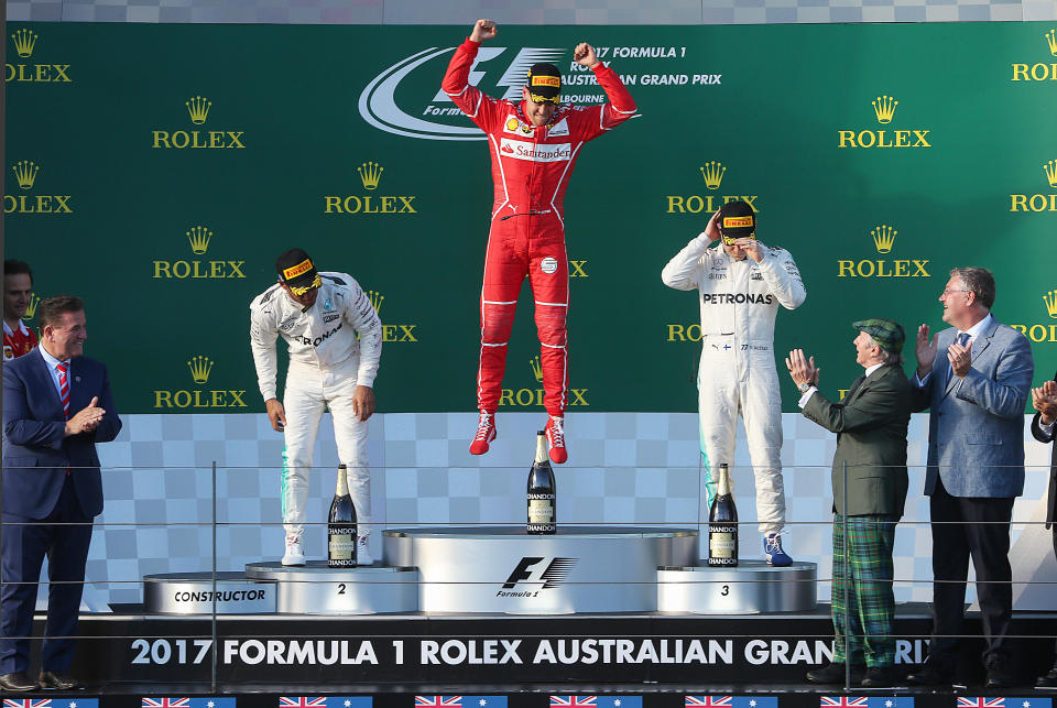 Ferrari’s Sebastian Vettel celebrates victory on the opening day of the 2017 F1 season, at Melbourne’s Albert Park circuit