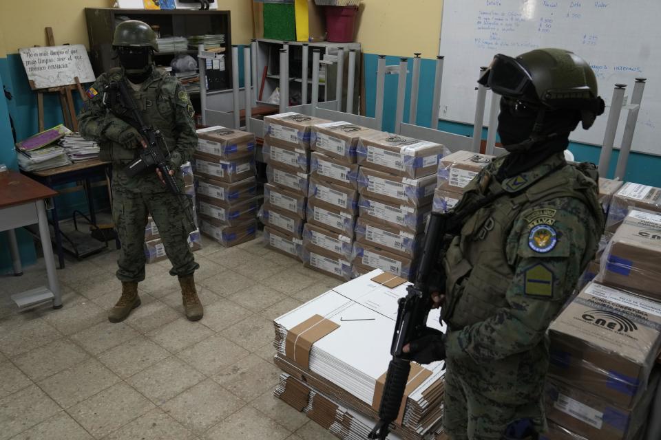 Soldiers guard electoral ballots in a public school in Duran, Ecuador, Friday, Oct. 13, 2023. Presidential elections will be held Oct. 15. (AP Photo/Martin Mejia)