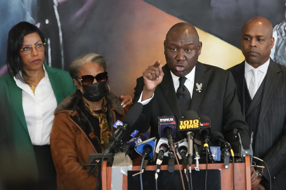 FILE - Attorney Ben Crump, speaks during a news conference, Feb. 21, 2023, at the Malcolm X & Dr. Betty Shabazz Memorial and Educational Center in New York, accompanied by the daughters of Malcom X, Ilyasah Shabazz, left, and Qubilah Shabbaz, second from left, and attorney Ray Hamlin, right. Some of Malcom X's family members and their attorneys announced their intent to sue governmental agencies for Malcom X's assassination and the fraudulent concealment of evidence surrounding the murder. In 1965, the minister and civil rights activist was shot to death inside Harlem's Audubon Ballroom in New York. (AP Photo/Seth Wenig, File)