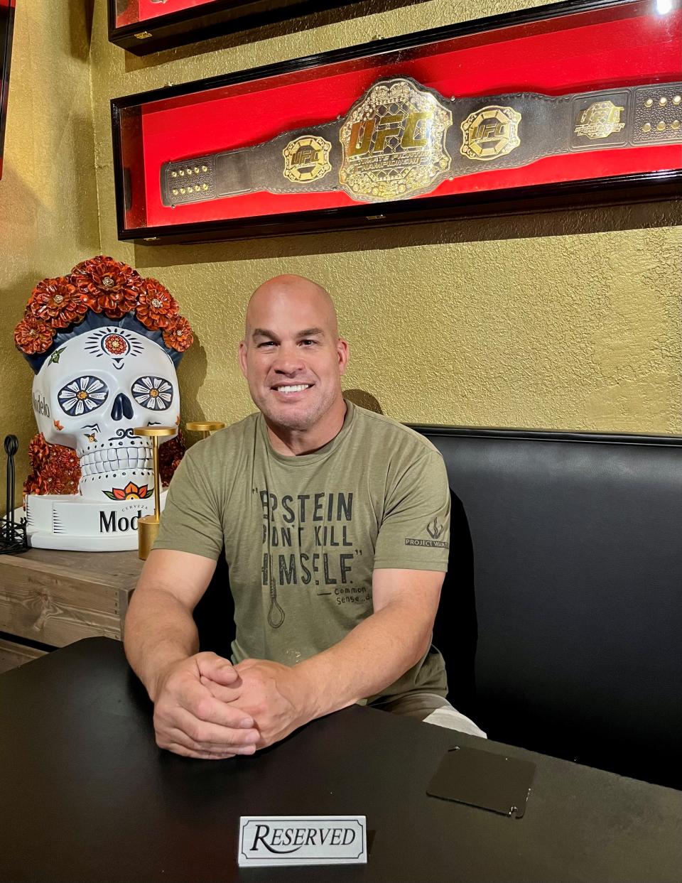 Tito Ortiz sits at the reserved table in the champions corner at Tito's Cantina in Cape Coral.