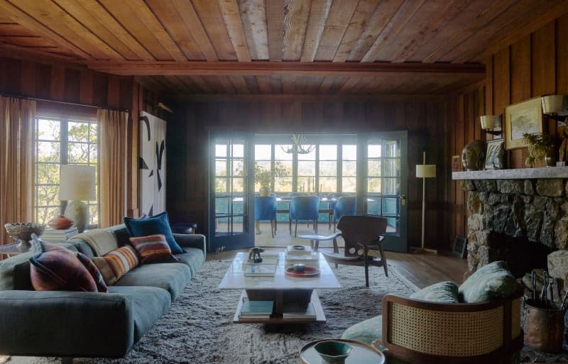 Wood paneled living room.