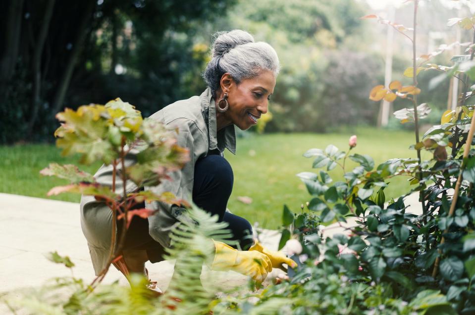 Woman tending to garden