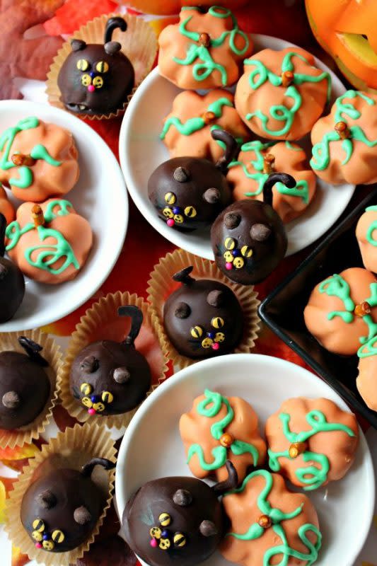 <p>The Monday Box</p><p>Sure they require some time and effort. But when the end product is as cute as mini cats and mini pumpkins, this recipe is undeniably worth giving a go. With your favorite movie playing in the background, time will go by in a jiffy!</p><p><strong>Get the recipe: <a href="https://themondaybox.com/peanut-butter-ball-pumpkins-cats/" rel="nofollow noopener" target="_blank" data-ylk="slk:Peanut Butter Ball Pumpkins & Cats;elm:context_link;itc:0;sec:content-canvas" class="link ">Peanut Butter Ball Pumpkins & Cats</a></strong></p>