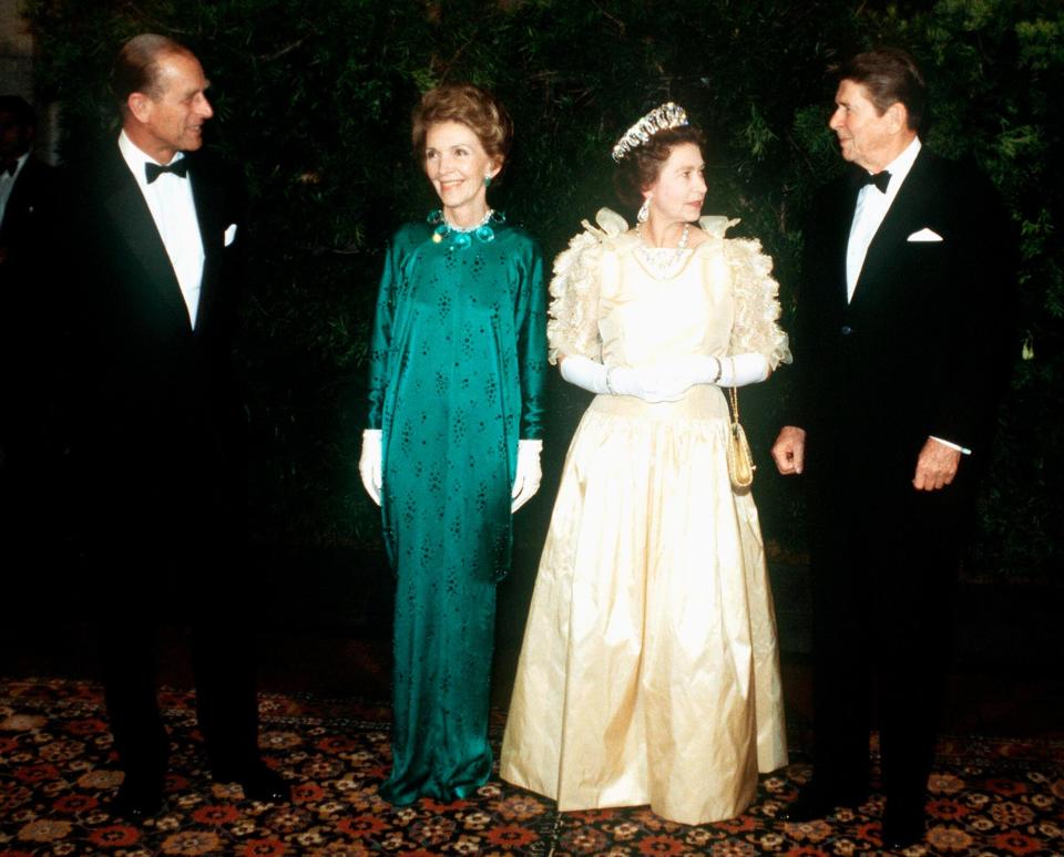 Queen Elizabeth II And Prince Philip With President Ronald Reagan And His Wife Nancy, The First Lady, Attending A Banquet During The Queen's Official Visit To The USA
