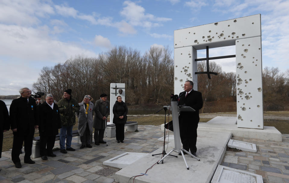 US Secretary of State Mike Pompeo delivers a speech at the Freedom Gate memorial in Bratislava, Slovakia, Tuesday, Feb. 12, 2019. Pompeo on Tuesday invoked the 30th anniversary of the demise of communism to implore countries in Central Europe to resist Chinese and Russian influence. (AP Photo/Petr David Josek)