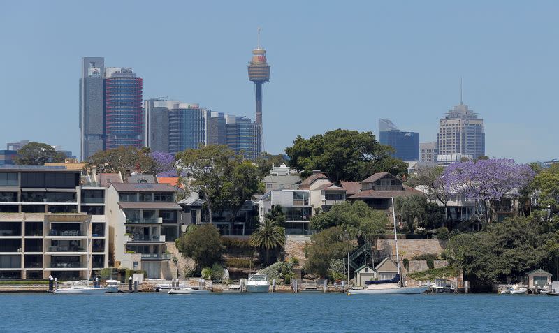 FILE PHOTO: FILE PHOTO: Sydney office buildings and commercial real estate appear behind Sydney waterfront properties in the suburb of Birchgrove